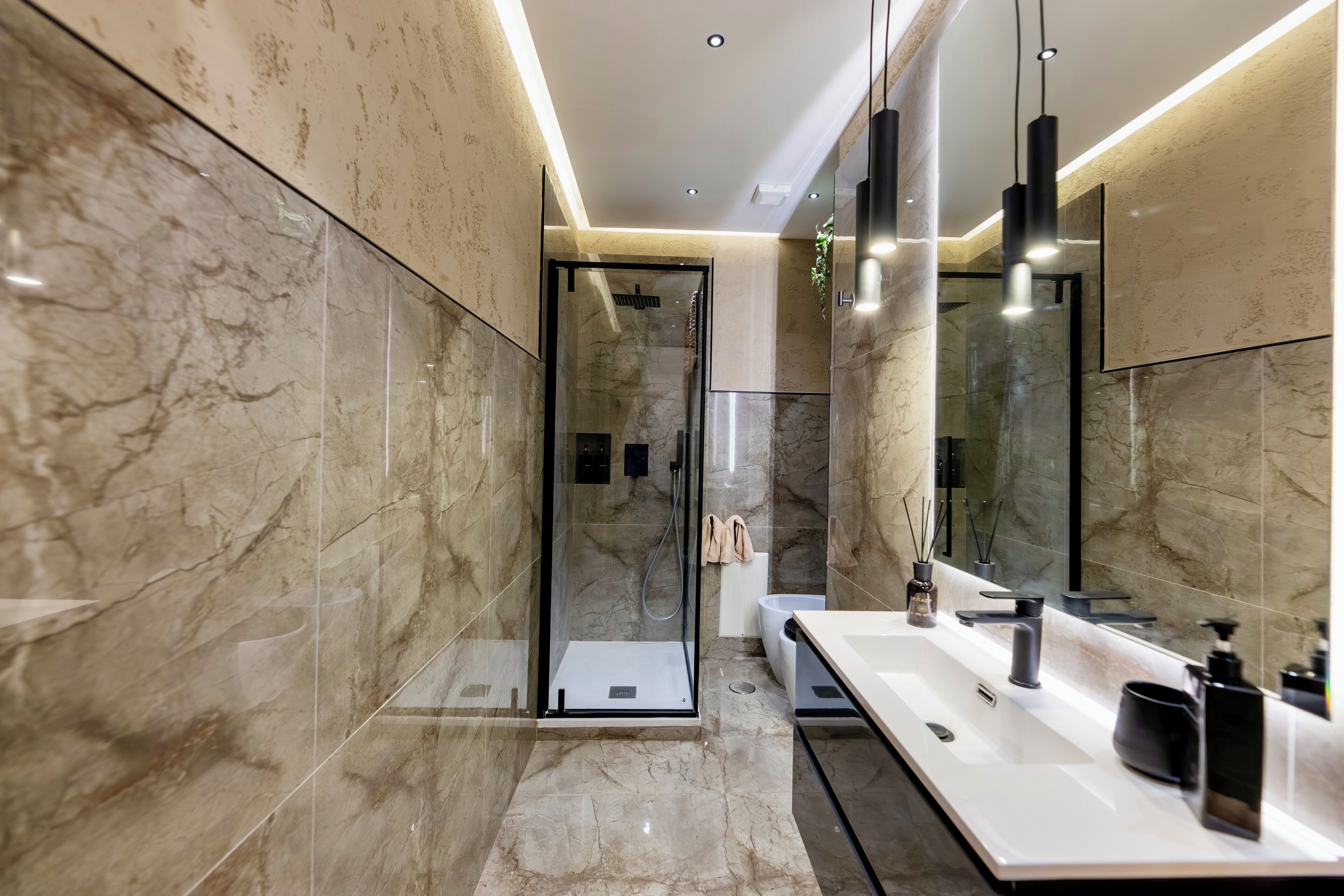 Shower, jetted tub, hair dryer, bidet