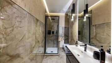 Shower, jetted tub, hair dryer, bidet