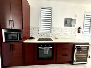 Private kitchen - Casa Marty. Spacious 4-bedroom house in pleasant Aguadilla with cool AC breeze. (Aguadilla)