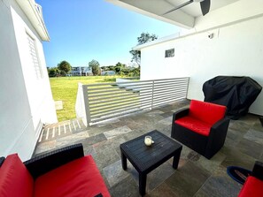 Terrace/patio - Casa Marty. Spacious 4-bedroom house in pleasant Aguadilla with cool AC breeze. (Aguadilla)