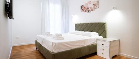 Een strijkplank/strijkijzer, gratis wifi, beddengoed