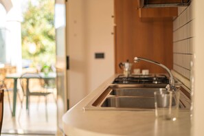 Fridge, oven, stovetop, cookware/dishes/utensils - Oasi di Luce - Two Bedroom Apartment, Sleeps 6 (San Teodoro)
