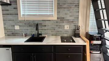 Fridge, microwave, stovetop, coffee/tea maker