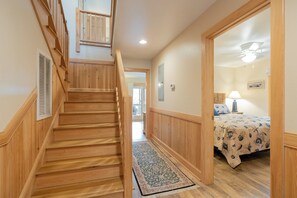 Warm wood accents and cozy touches create a welcoming atmosphere as you move through your home-away-from-home.