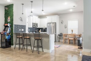 Fridge, microwave, oven, stovetop - The Denison Hub: Lake, Choctaw, Arcade, EV, Patio! 🏡 (Denison)