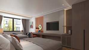 A modern hotel room with two beds, a desk with a laptop, a TV, and a large window with curtains. - Binh Minh Sapa Hotel (Sa Pa)