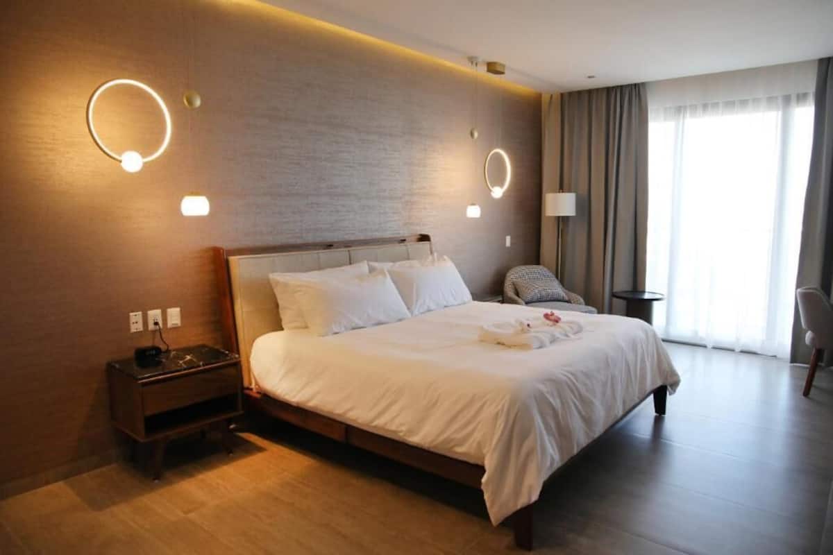 Luxury Suite, Balcony, City View | In-room safe, iron/ironing board, free WiFi