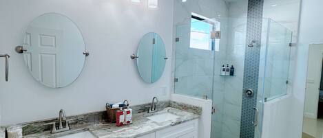 Shower, hair dryer, towels, soap