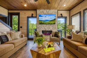 TV, fireplace, video games, stereo - Firefly Lodge – Pool, Hot Tub, Theater & Resort | Pigeon Forge Cabin Sleeps 18 (Sevierville)