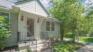 A single-story house with a front porch, a small front yard, and a mailbox. - Resort-Style Retreat w/ Pool, Prime OP Location (Mission)