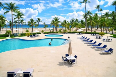 Beautiful Beachfront 2BR Apt | Large Pool & Stunning Terrace