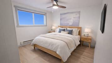 2 habitaciones, tabla de planchar con plancha y cuna de viaje