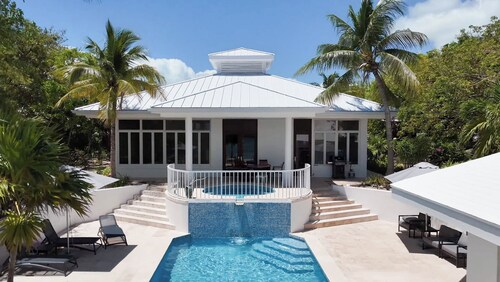 Canal-Front Villa in a Tropical Paradise in Leeward Settlement!