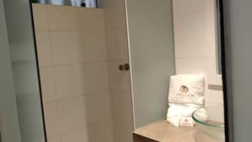 Deluxe Double Room | Bathroom | Shower, towels, soap, shampoo