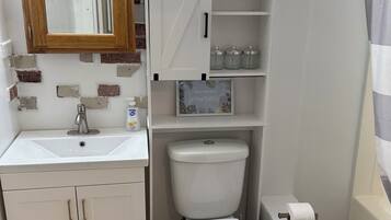 Hair dryer, towels, soap, toilet paper