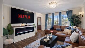 Smart TV, fireplace, books