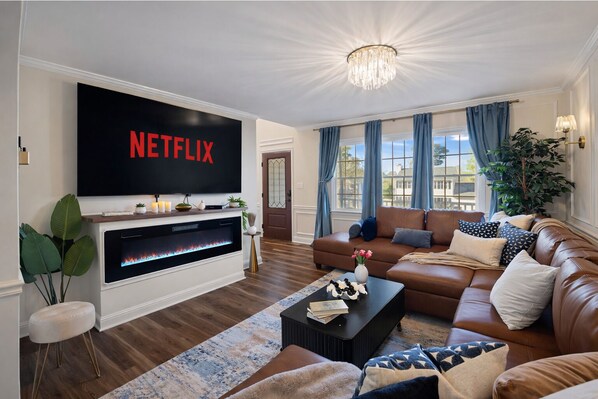 Smart TV, fireplace, books