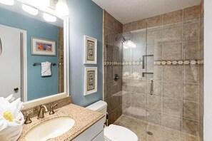 Shower, jetted tub, hair dryer, towels