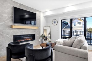 TV, fireplace - 3BR Rockies Haven. Sleeps 8 with Hot Tub, Pool and Mountain Views (Canmore)