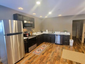 Fridge, microwave, oven, stovetop - H1 - Two-Bedroom Apartment (Lake Placid)