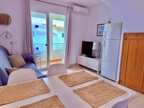 TV - Sa Caleta Apartment with swimming pool next to the beach (Cala En Blanes)