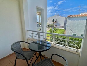 Outdoor dining - Sa Caleta Apartment with swimming pool next to the beach (Cala En Blanes)