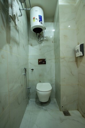 Ducha, bidé, toallas y jabón