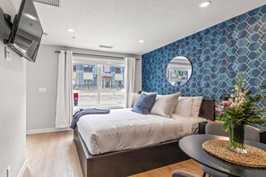 Tabla de planchar con plancha, wifi gratis y ropa de cama 