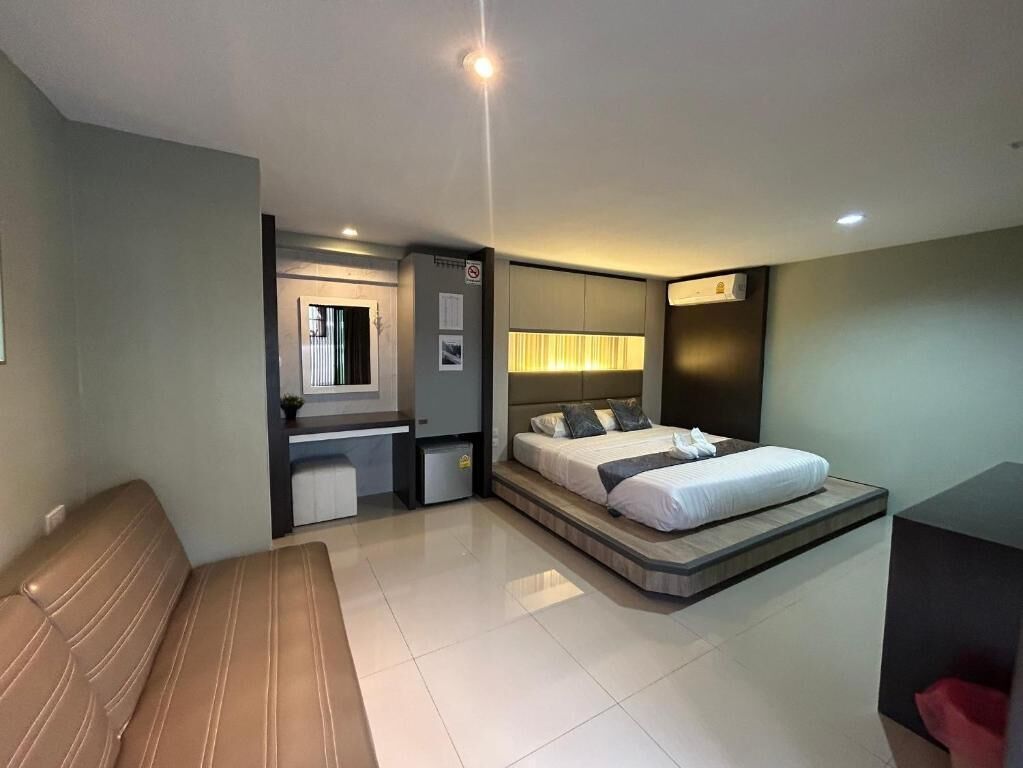 Habitación triple, lanai, vista al jardín | Wifi gratis y ropa de cama 