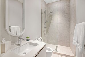 Shower, hair dryer, towels, soap - Modern 2BR  Steps to Beach Gated Community w/Gym (Nassau)