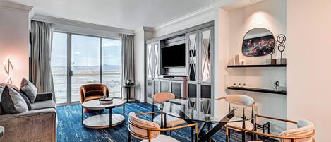 Family Suite, Balcony, City View | Living area | 42-inch flat-screen TV with satellite channels