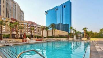 Outdoor pool, free pool cabanas, pool umbrellas