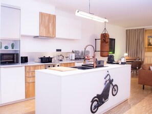 Fridge, microwave, oven, dishwasher - "Industrial Sanctum" by Interhome (Brussels)