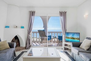 TV, fireplace, offices - Bright Beachfront Apartment - ref 157 by Costarentals (Las Lagunas de Mijas)