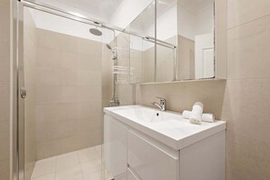 Hair dryer, towels, soap, shampoo