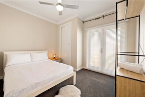 Room - Coastal Cues @ Caves | Relaxed Beachside Retreat with Verandah & Fenced Yard (Lake Macquarie City Council)