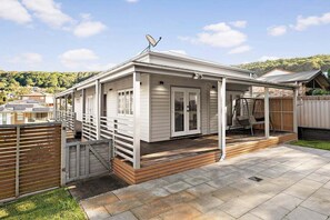 Exterior - Coastal Cues @ Caves | Relaxed Beachside Retreat with Verandah & Fenced Yard (Lake Macquarie City Council)