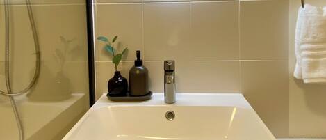Hair dryer, towels, soap, shampoo