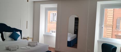 Family Room, Ensuite, Corner | Premium bedding, down comforters, in-room safe, free WiFi