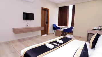 Luxury Suite, City View | Desk, laptop workspace, free WiFi