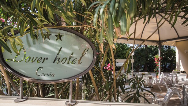 A hotel sign with the name 'Dover Hotel' and 'Cervia' underneath. - Hotel Dover Rooms & Coffee - Adults Friendly (Cervia)