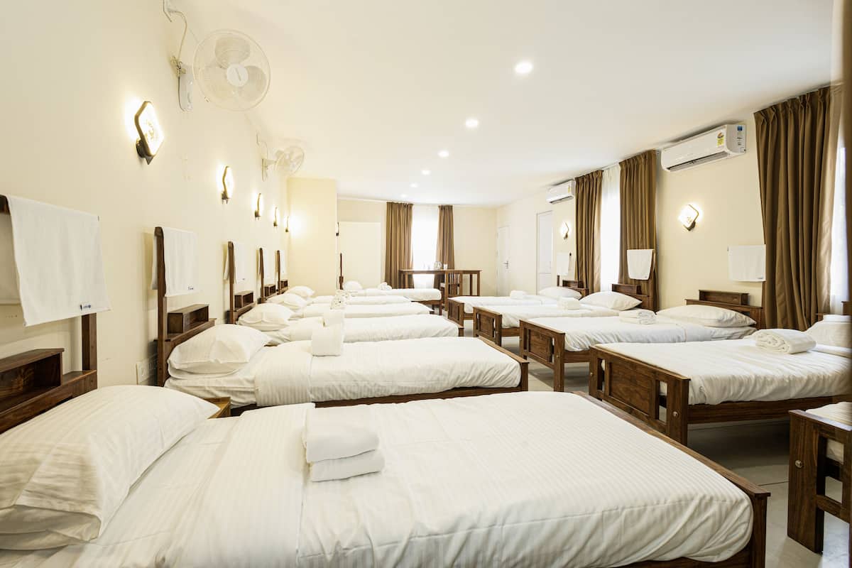 Deluxe Shared Dormitory, Garden View | In-room safe, desk, laptop workspace, iron/ironing board