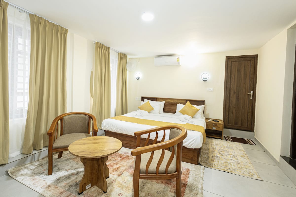 Family Double Room, Garden View | In-room safe, desk, laptop workspace, iron/ironing board