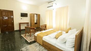 Deluxe Double Room, Garden View | In-room safe, desk, laptop workspace, iron/ironing board