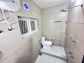 DWARAKA-104 Standard | Bathroom | Shower, soap, shampoo, toilet paper