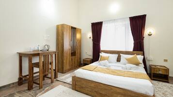 Deluxe Double Room, Balcony, Garden View | In-room safe, desk, laptop workspace, iron/ironing board