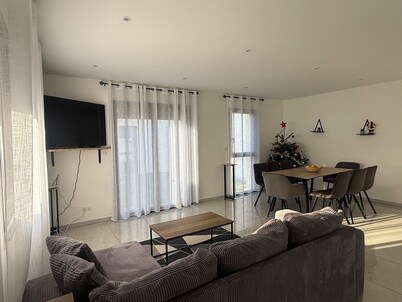 New house or town center + parking space