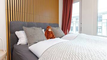 Deluxe-huoneisto, kaupunkinäköala | Kannettavalle tietokoneelle sopiva työtila, ilmainen Wi-Fi