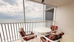 Outdoor dining - Gateway Villas #694 Beachfront Condo w/ Private Balconies & Gulf View (Fort Myers Beach)