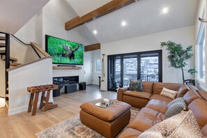 Smart TV, fireplace, foosball